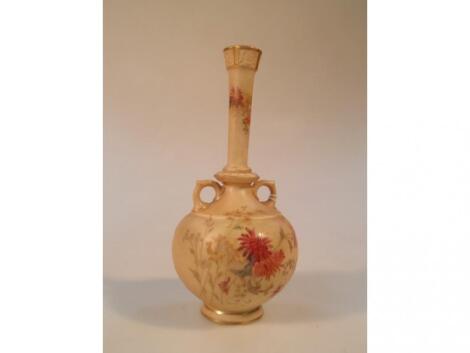 A Royal Worcester bottle vase with small loop handles to the shoulders