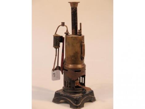 A brass and black tin stationary steam engine