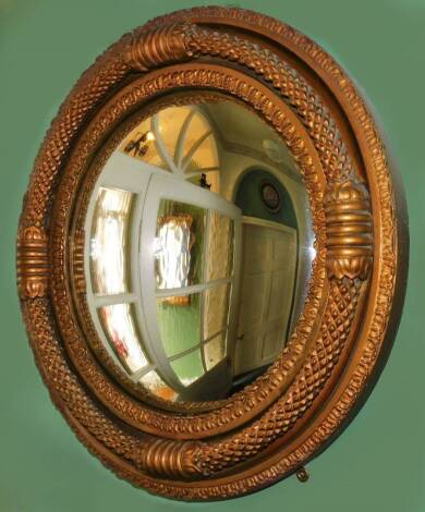 A circular convex porthole mirror, with triple moulded frame, 52cm Dia.