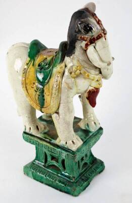An antique Chinese T’ang style glazed elephant, (much damage), 30cm H. - 2