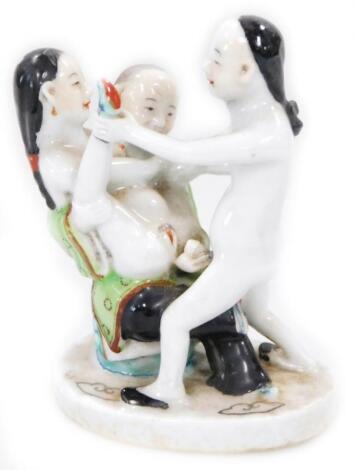 A Chinese porcelain erotic figure group