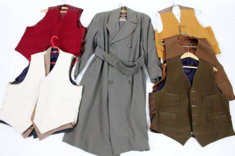 Various waistcoats, suede type etc., and three quarter length Baracuta Meakers trench coat in green, sizes unknown. (a quantity) From the estate of R J ‘Bob’ Curry (Dec’d) of Grantham.