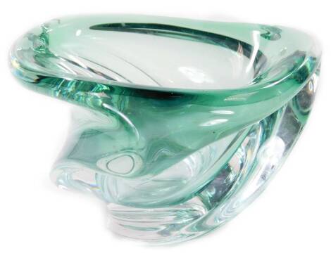 A 20thC studio glass bowl, in green and clear glass, unmarked, 18cm H.