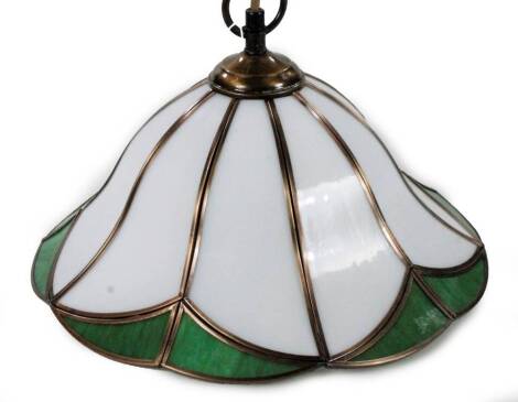 *An as new light fitting, with flowerhead shade predominately in green and white, 22cm H.