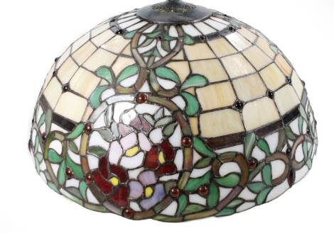 *An as new light fitting, with Tiffany style shade decorated with panels and flowers predominately in green, pink and fawn, 48cm Dia.