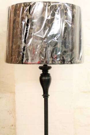 *An as new electrical standard lamp, on shaped baluster stem with textured floral shade predominately in black, 157cm H.