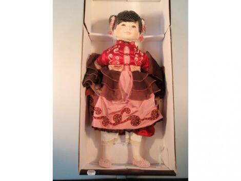 A Mundia ceramic doll 'Mei Ling'