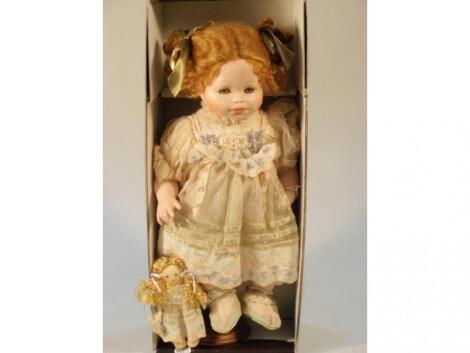 A Mundia ceramic doll 'Margot et sa poup?e with certificate and box