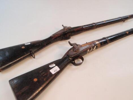 Two antique side lock percussion rifles