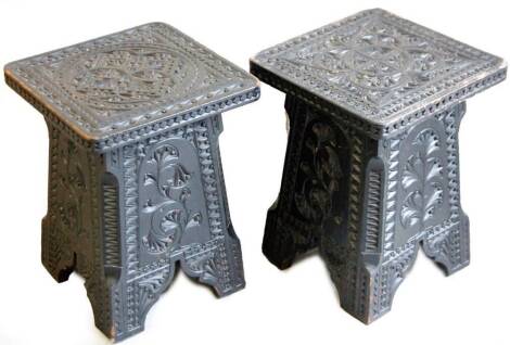 Two 19thC ebonised oak stools, with square tops, each carved with a geometric floral pattern, 31cm H, 22cm W, 22cm D. (2)