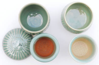 Various Chinese celadon porcelain, to include a drainer with D & S Howlett Collection label, a similar labelled bowl and another lidded example, partially ribbed, 10cm H. - 5