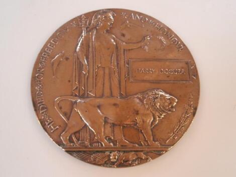 A WWI bronze death plaque for Charles Allen Brett