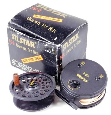 A Silstar FG-6 fly reel, 10cm Dia., and a further fishing reel. (2, with one box)