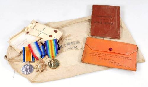 A WWI medal group, comprising 1914 August-November Star, Campaign and Victory medals, with ribbons, each similarly marked, 2207 PTE W. Lambert R.LANC.R, with various ephemera, to include pay book, B.2079 paper, etc, and other associated ephemera. (a quant