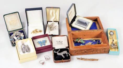 A quantity of costume jewellery, to include marcasite stag brooch, silver plated, decorative brooches, jewellery box, collectors spoon, dress rings, silver collectors bracelet with enamel shield fobs, etc. (a quantity)