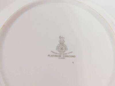 A Royal Doulton porcelain part dinner tea and coffee service decorated in the Platinum Concord pattern, comprising a pair of meat platters, oval dish, sauce boat on stand, six dinner and eight side plates, six fruit bowls, salt and pepper, six soup cups, - 4