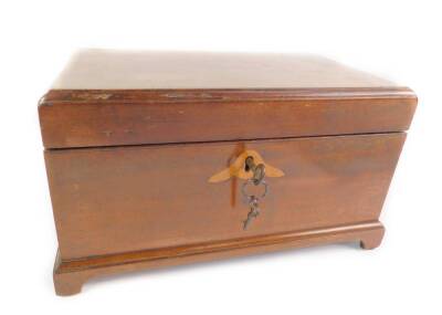 A late Georgian mahogany and inlaid tea caddy, of rectangular casket form, opening to reveal three recesses and two metal canisters, raised on bracket feet, with key, 24.5cm W, 14.5cm D, 13.5cm H.