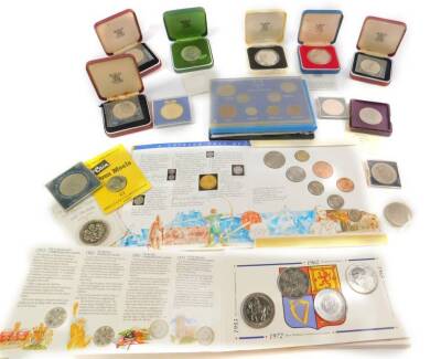 Commemorative and uncirculated coinage, including QEII sixpences, QEII crown collection, Festival of Britain crown, St Helena commemorative 25p pieces, and a gold plated medal commemorating the 40th Anniversary of Blue Peter. (qty)