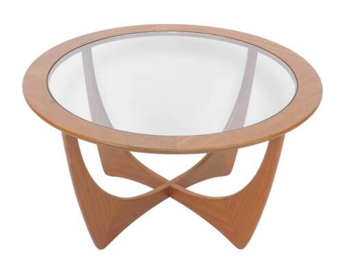 A G-Plan teak Astro coffee table, the circular top inset centrally with circular glass, raised on four shaped legs, 46cm H, 83cm W, 83cmD.