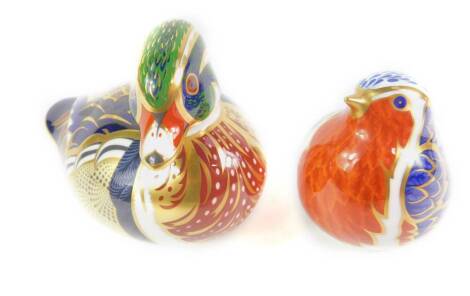 A Royal Crown Derby Imari paperweight, modelled as a Carolina duck, and another modelled as a robin. (2)