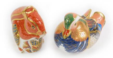 A Royal Crown Derby Imari paperweight modelled as a Mandarin duck, and another modelled as a red squirrel. (2)