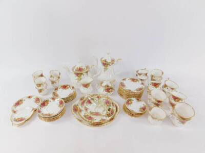 A Royal Albert porcelain part tea and coffee service, decorated in the Old Country Roses pattern, some seconds, comprising tea pot, coffee pot, cream jug, sucrier, bread plate, two tier cake stand, and single tier cake stand, twelve tea cups, saucers and - 2