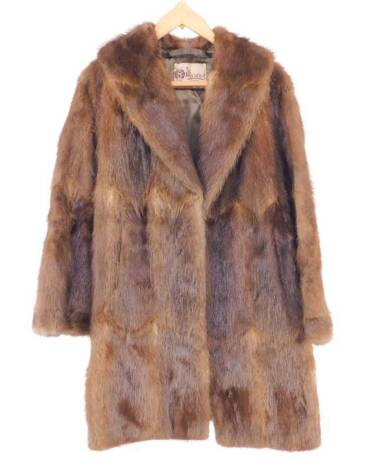 A vintage musquash fur coat, by Marcus of London.