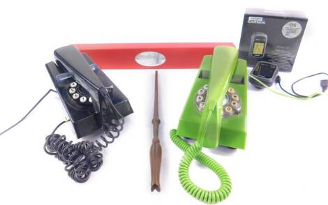 Two Geemarc trim line telephones, one in black the other in green, together with a Garmin eTrex 30 and a Harry Potter Luna Lovegood replica wand, boxed. (4)