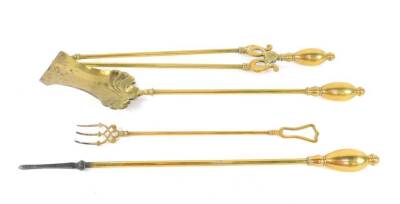 A set of three Victorian brass fire irons, comprising shovel, poker and pair of tongues, 69cm L, together with brass toasting fork, 49cm L. (4)