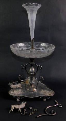 A late 19thC James Dixon & Sons silver plated and cut glass epergne, with a single trumpet above a cut glass bowl, raised on a baluster column with scrolling supports, over a triform base mounted with three stags at points (one stag missing), raised on si