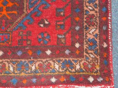 An Azari runner, red ground, 320cm x 92cm.