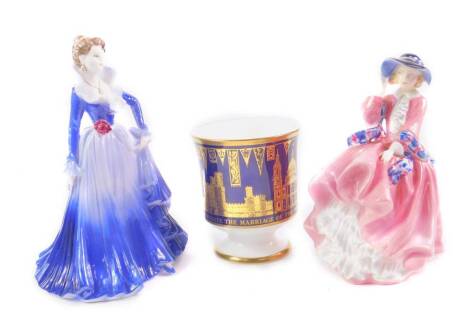 A Royal Doulton figure modelled as Top O’ The Hill, HN1849, together with a Coalport figure modelled as Anne, Ladies of Fashion, Figurine of the Year 1997, and a Coalport Porcelain cup commemorating the Marriage of HRH The Prince of Wales and Lady Diana S