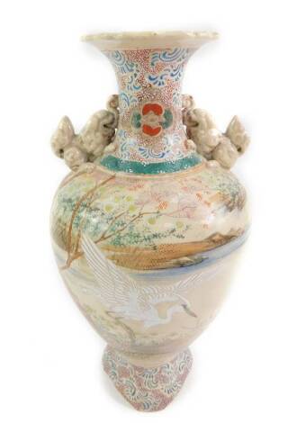 A Japanese early 20thC Satsuma vase, of baluster form, decorated with a heron in a coastal landscape, 36cm H. (AF)