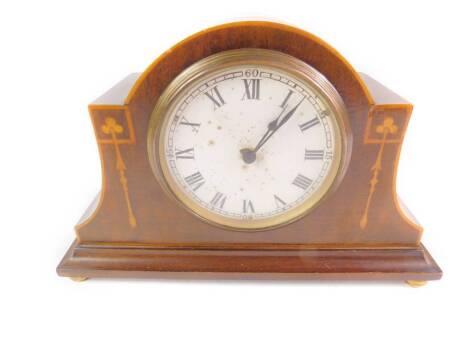 An Edwardian mahogany and boxwood inlaid mantel clock, enamel circular dial bearing Roman numerals, Burem movement with integral key, the case raised on four brass ball feet, 14.5cm H, 23cm W, 8.5cm D.