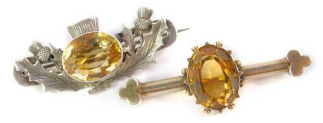 A Victorian silver and Cairngorm brooch in a thistle design, Birmingham 1890, and an oval Cairngorm set bar brooch, 12.0g.