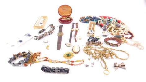 Costume jewellery, including necklaces, brooches, gentleman’s and lady’s wristwatches, together with commemorative teaspoons.