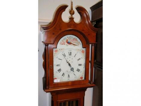 A modern traditional style long case clock by Comitti of London in a yew case