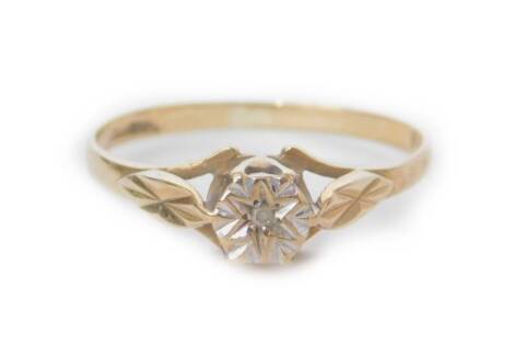 A 9ct gold dress ring, with illusion set CZ stone in star design borders, with pierced shoulders, size O, 1.5g all in.