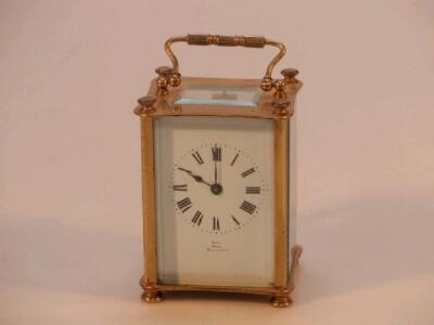 An early 20thC gilt metal carriage clock