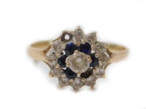 A 9ct gold floral cluster ring, set with three layer stones, including CZ (two missing) in claw setting, maker W & G, size Q, 2.2g all in.