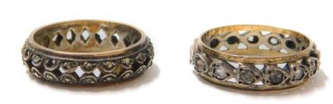 Two 9ct gold and silver eternity rings, one set with marcasite stones, the other set with white paste stones, 5.5g all in.