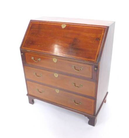 An Edwardian mahogany and satin wood cross banded bureau, the fall flap opening to reveal a central door flanked by drawers and recesses, over three long graduated drawers, raised on bracket feet, 91cm H, 81cm W, 44.5cm D.