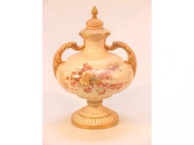 A Royal Worcester two-handled pedestal vase and cover painted with summer