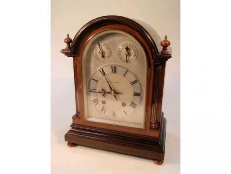 An early 20thC mahogany cased mantel clock of George III style