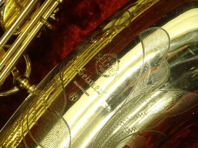 A Selmer brass baritone saxophone to low A, engraved Selmer, Made In France, with registration letter, number 131713, 100cm H. - 3