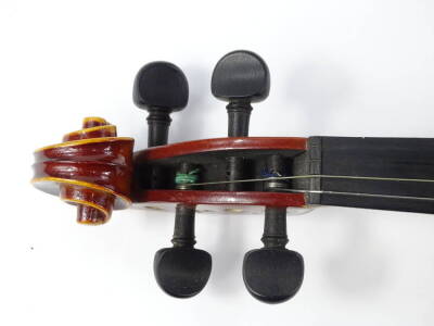 A Romanian violin, bearing facsimile label, with two piece back and a bow with nickel plated mounts length of back 35.5cm. - 4