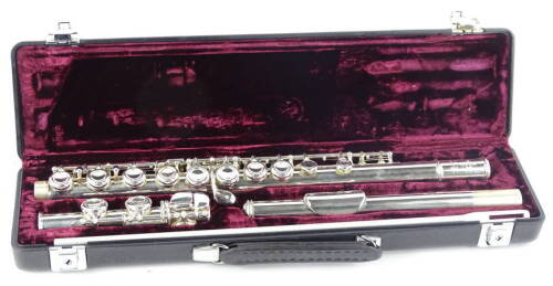 A Buffet Crampon plated flute, in three pieces with Cooper seals in a fitted case.