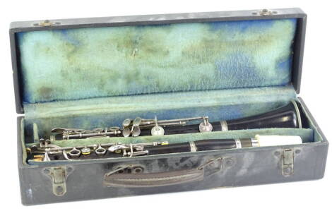 An early to mid 20thC clarinet by J R Lafleur and Son, with silver plated mounts, indistinct makers stamp number 38865, in a fitted case.