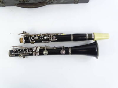 An early to mid 20thC clarinet by J R Lafleur and Son, with silver plated mounts, indistinct makers stamp number 38865, in a fitted case. - 2