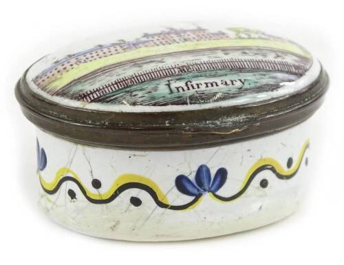 A late 18th/early 19thC Staffordshire type enamel patch box, the lid decorated 'A present from Manchester' and with a scene of Manchester Infirmary, the base with a stylised wavy design, 4.5cm W.